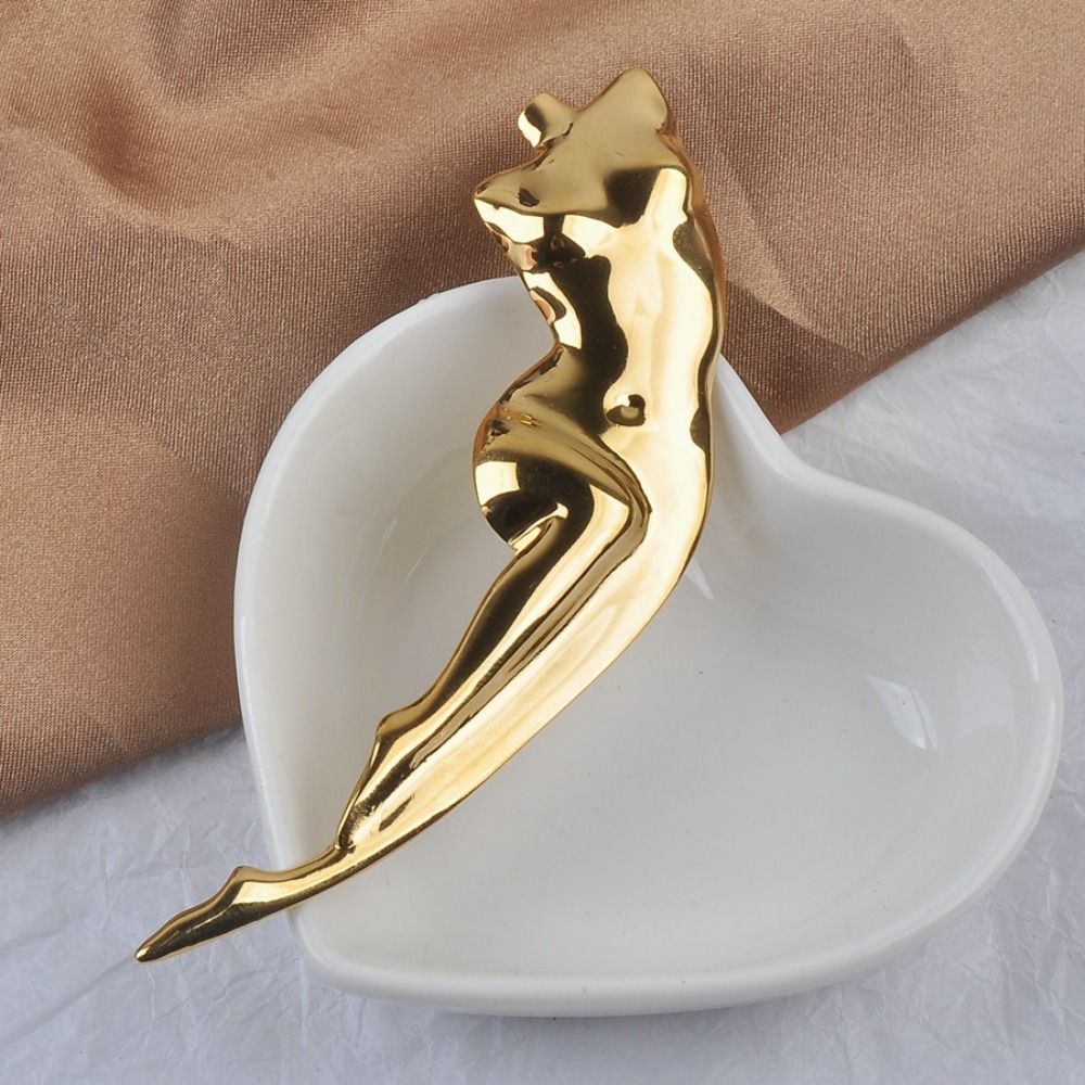 Broches sculptées en alliage b - Body Jewelry Brands avis et prix